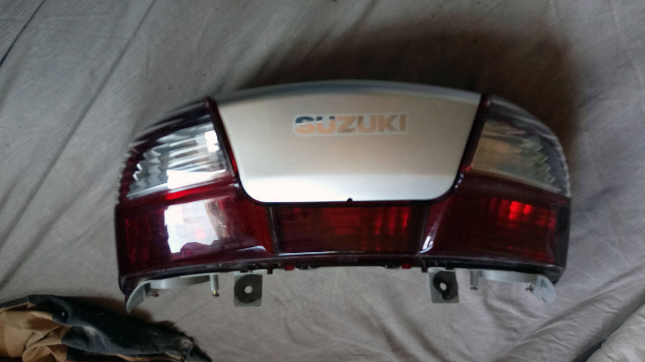 Задний фонарь Suzuki Skywave 250-400